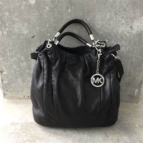 michael kors leather protector uk|Michael Kors genuine leather handbags.